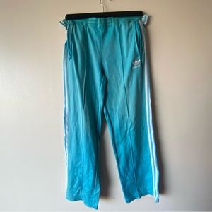 Blue Adidas track pants